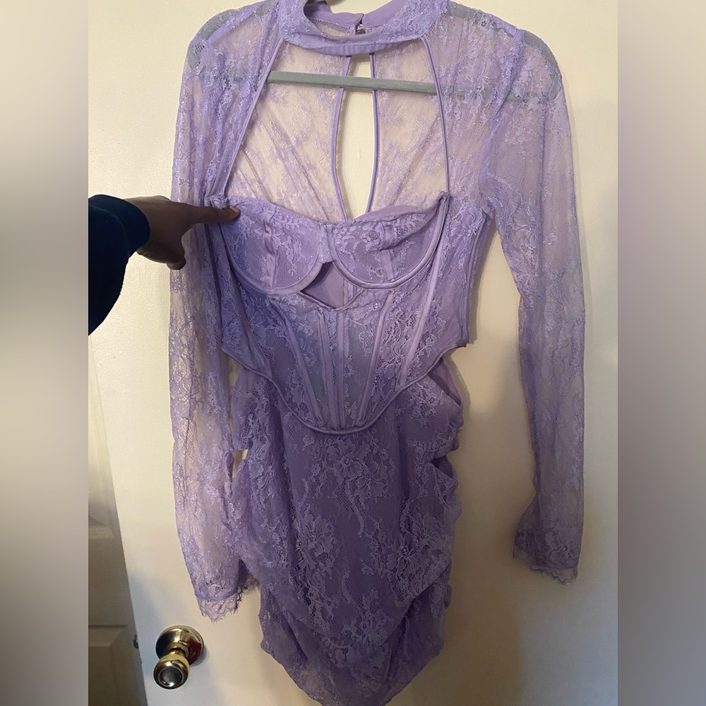 is a purple dress that was worn on a birthday. worn once still in great shape